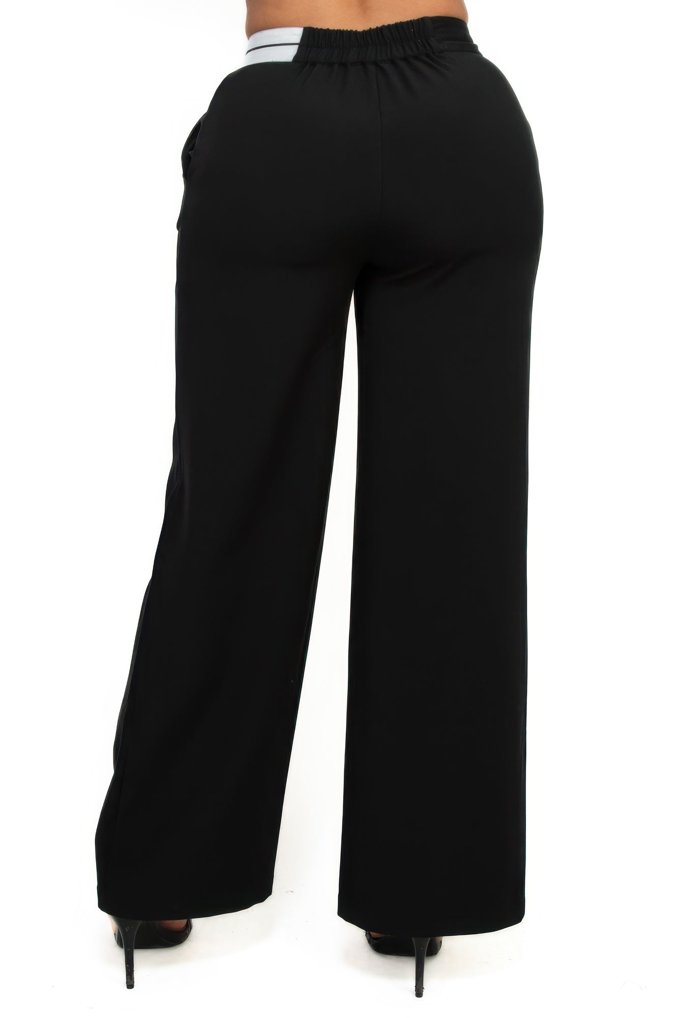 Back view of black high-rise wide-leg pants with elastic contrast waistband