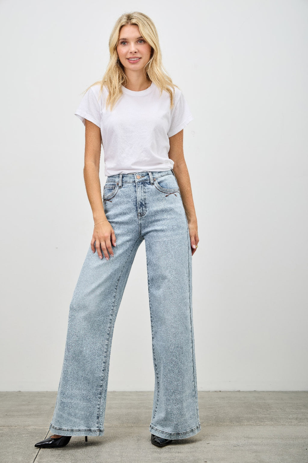 High rise wide-leg jeans, light blue denim with belt loops and wide straight flare