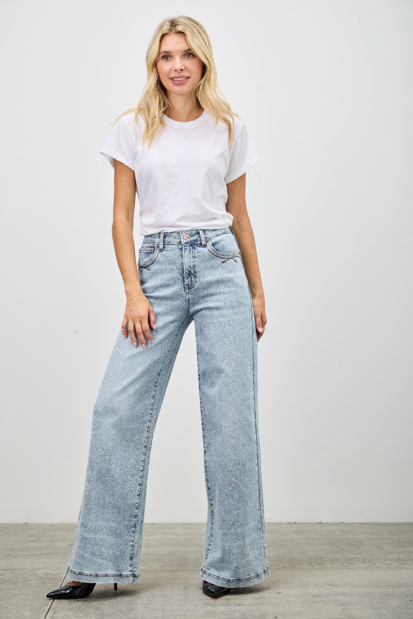 High rise wide-leg jeans, light blue denim with belt loops and wide straight flare