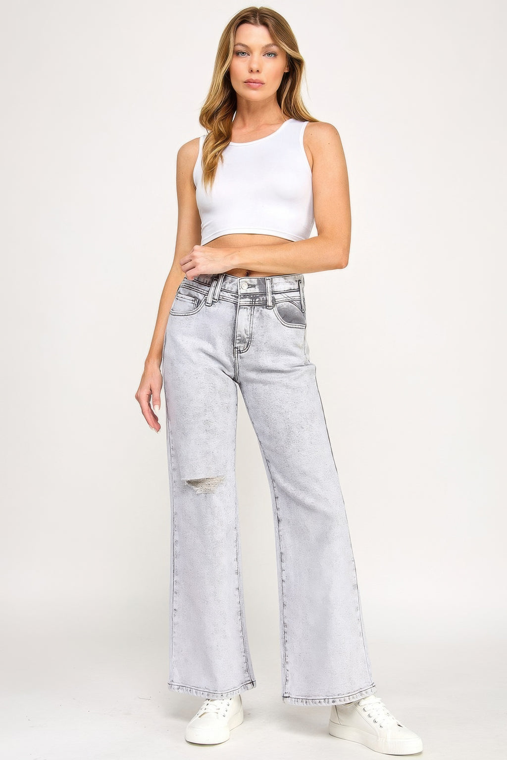 Acid grey wide-leg jeans with thigh rips and button-zip fly.