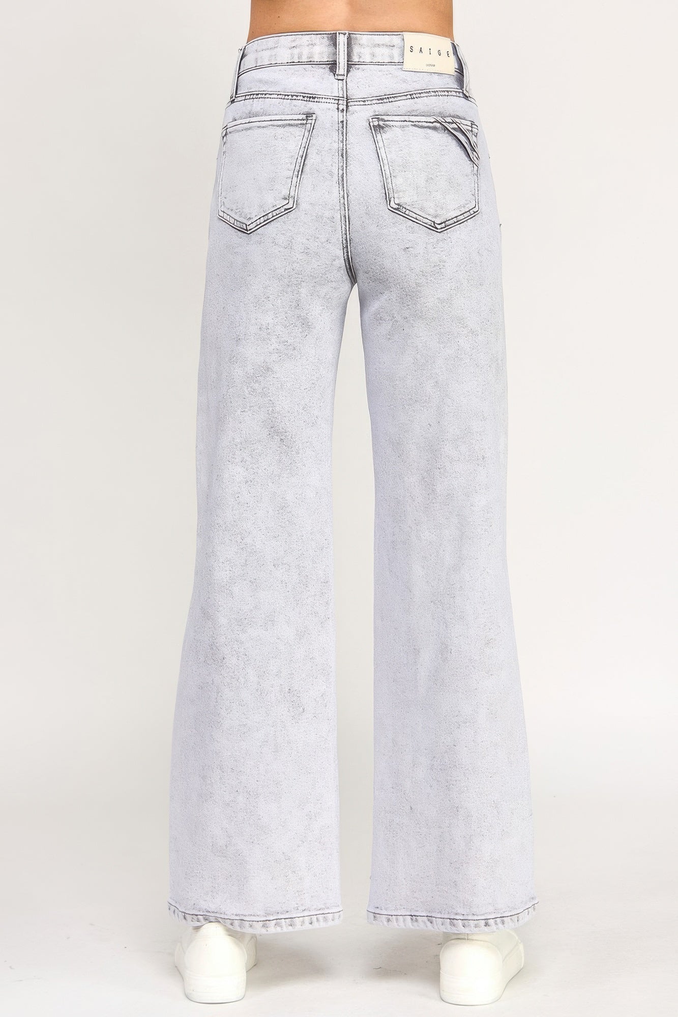 Back view: acid grey high-rise wide-leg jeans with belt loops and rear pockets.