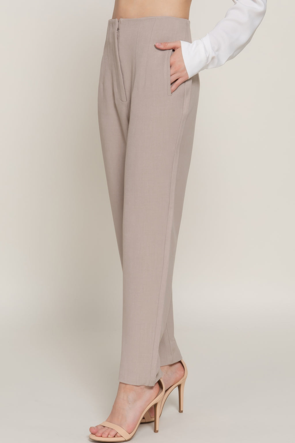 High-waist long pants in heather taupe, side view with pintuck detail