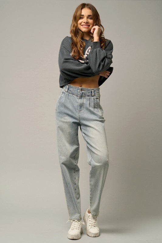 Denim-style light high-waisted balloon jeans with roomy silhouette and front pockets