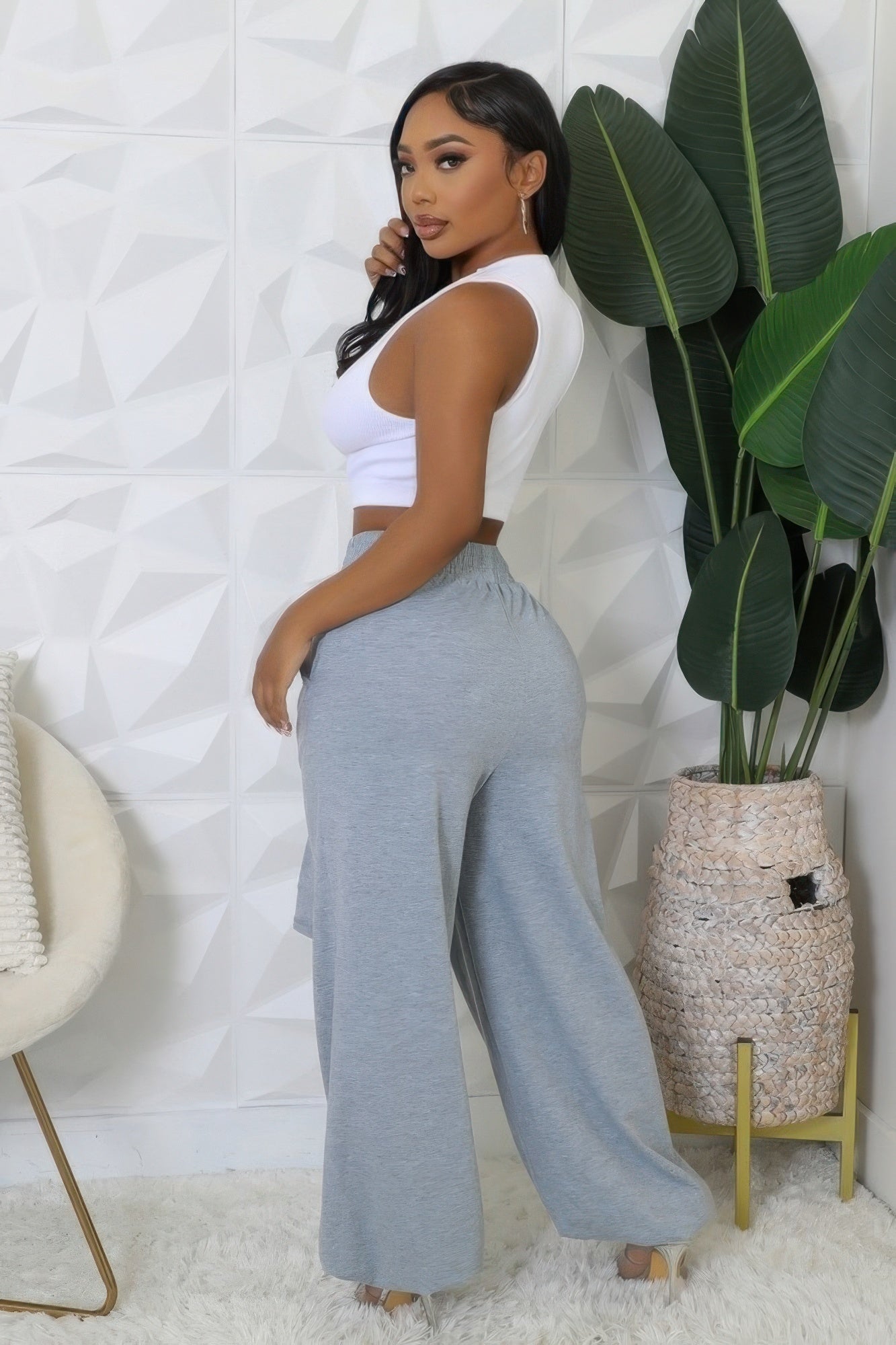 High-waisted heather grey stretch pants, tie-waist drape and relaxed wide legs