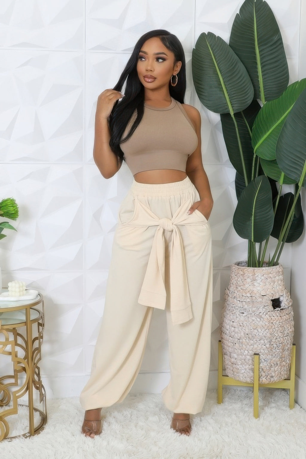 Bone high-waisted stretch pants with wide legs and bow-tie waistband detail