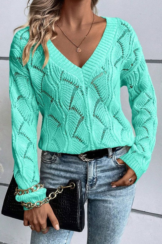 Green hollow-knit V-neck sweater with long sleeves, drop-shoulder silhouette