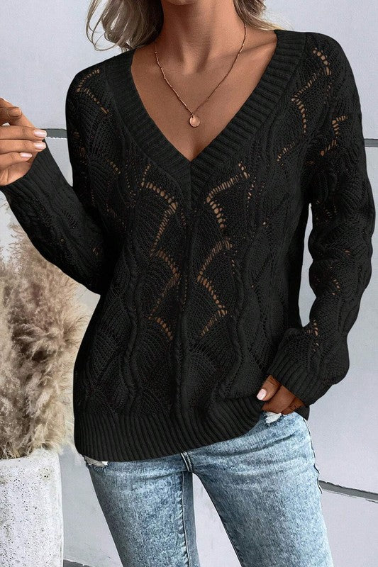 Black hollow-knit V-neck drop-shoulder sweater with openwork texture and ribbed cuffs