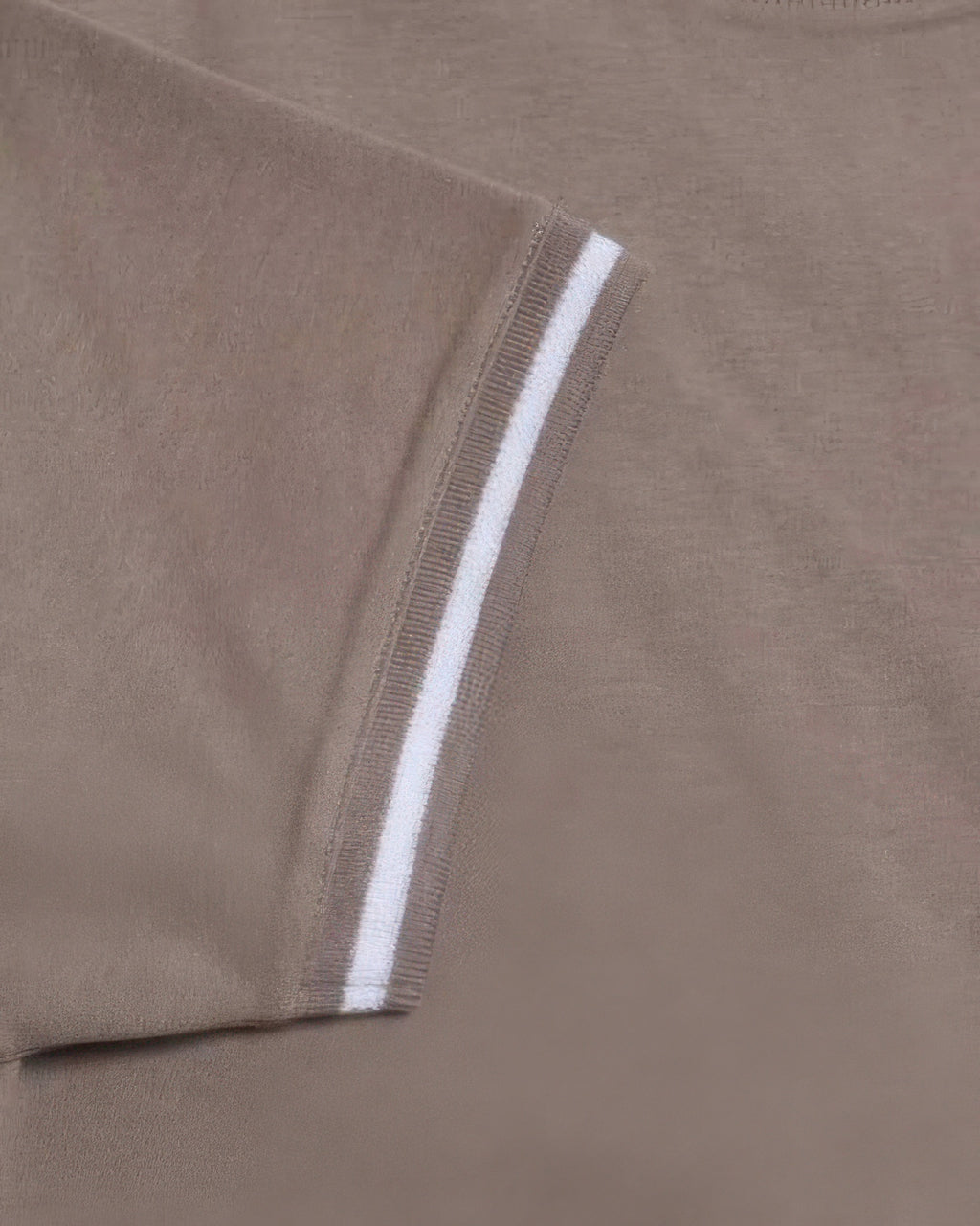 Short sleeve hem with white-and-brown striped tape on taupe-brown Interlock Crew Tee