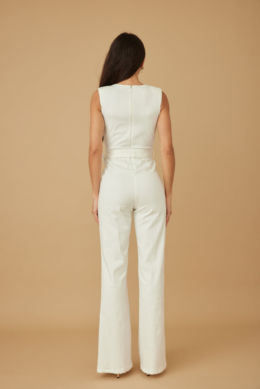 White wide-leg strap jumpsuit with back seam and waist tie detail