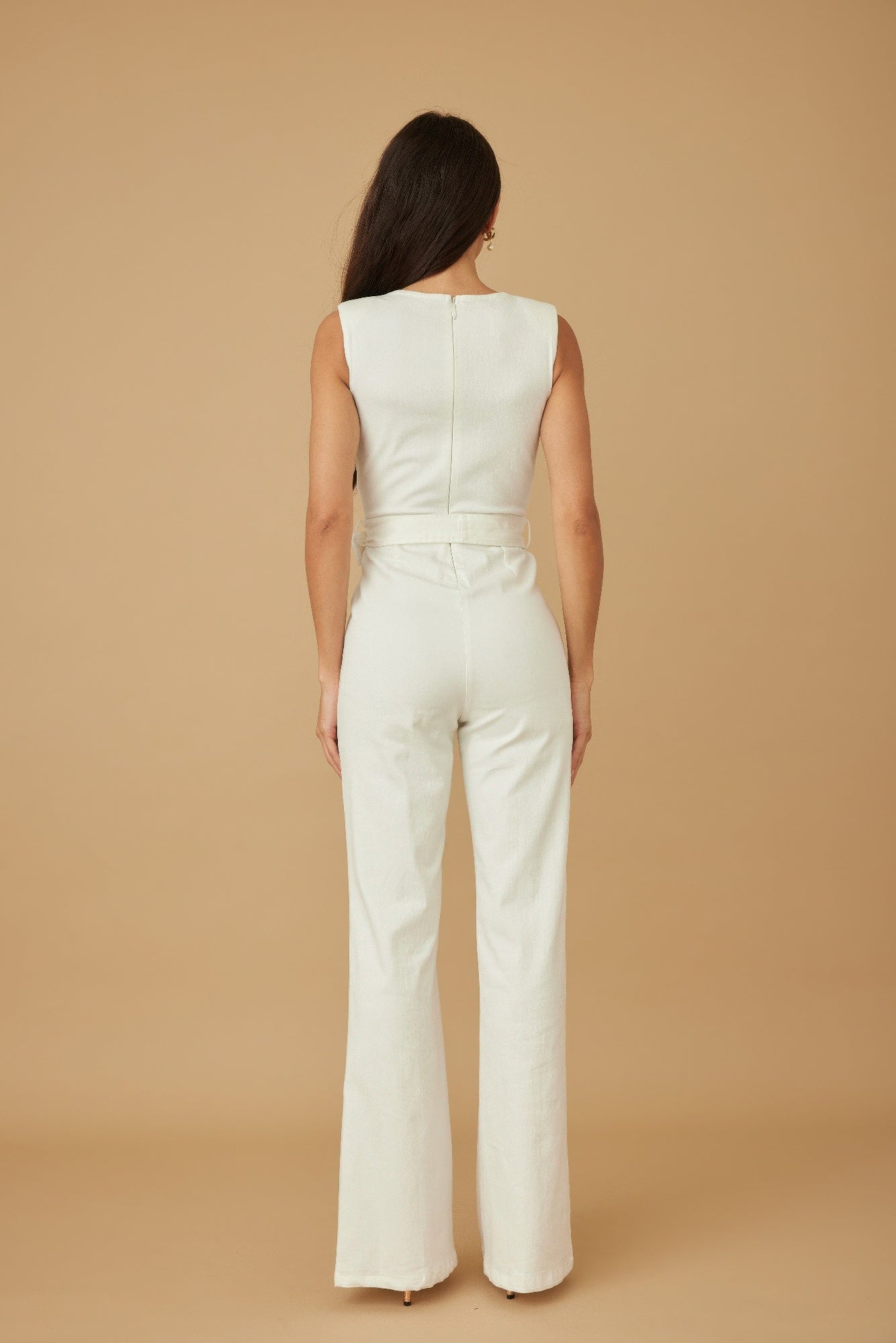 White wide-leg strap jumpsuit with back seam and waist tie detail