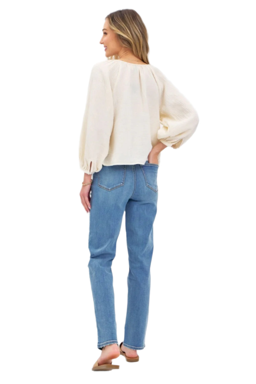 High-waist straight jeans in medium wash from the back with back pockets