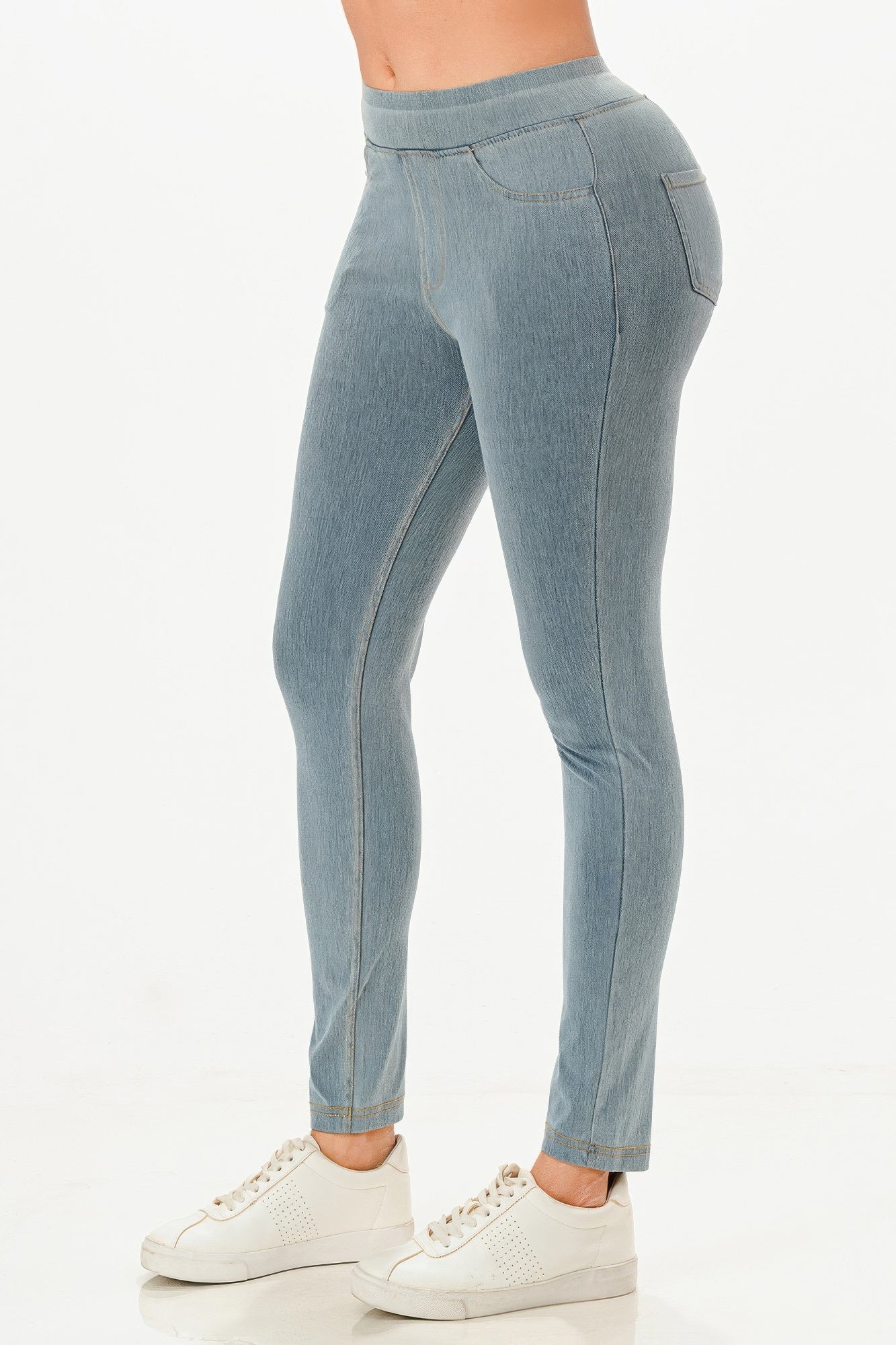 Ultra Soft Jegging Jeans in light wash denim, side view showing tapered leg shape