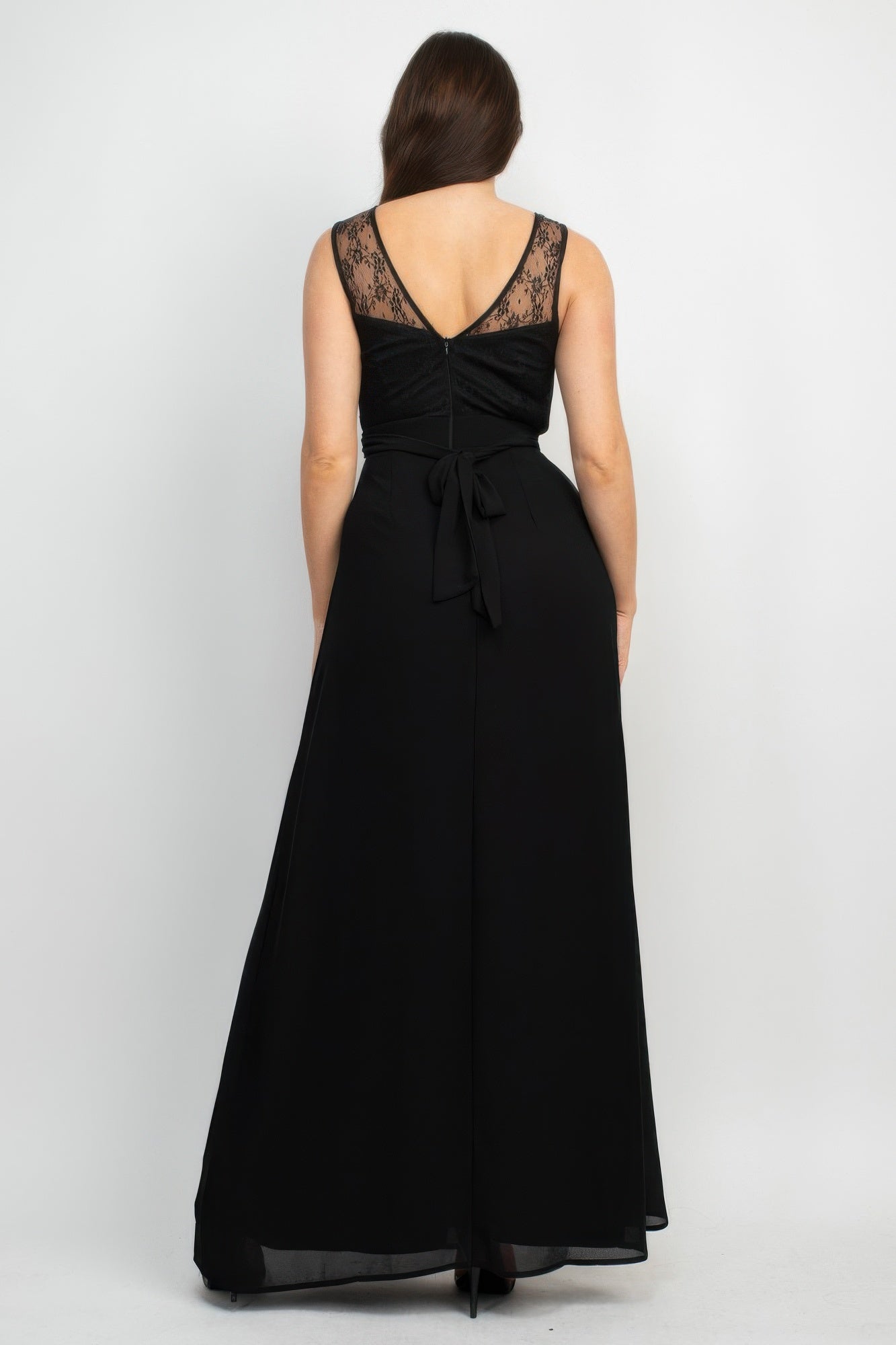 Back view of black lace maxi dress with open-back detail and tied waist