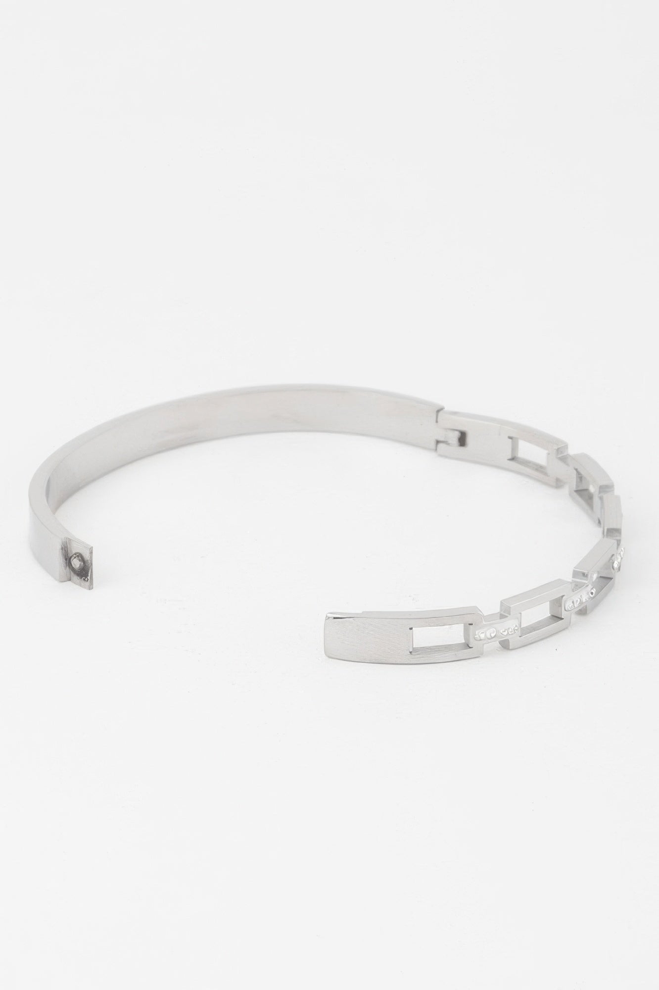 Silver-tone jeweled chain clasp bracelet with clear stones and rectangular links