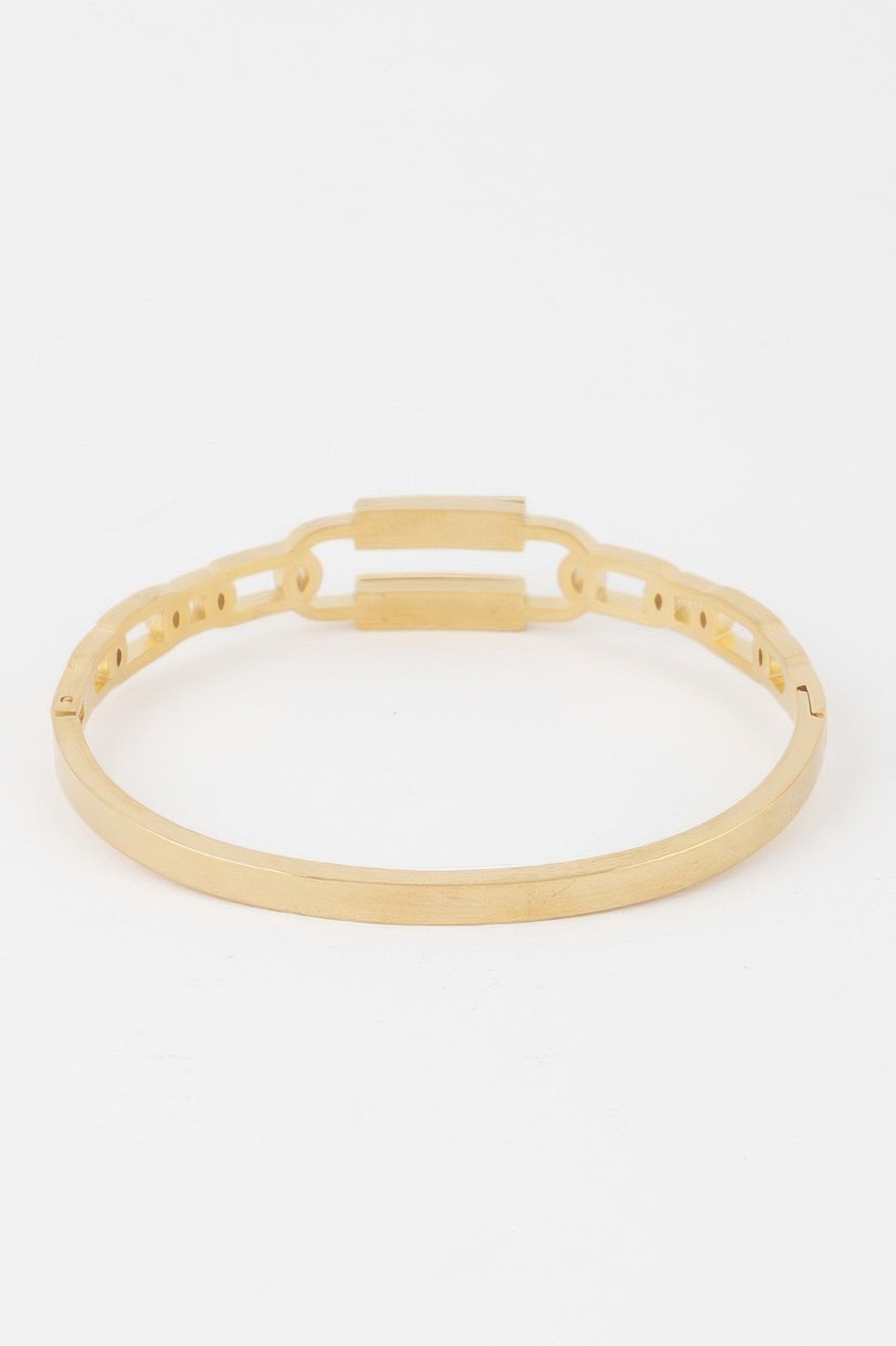 Gold curb chain cuff bracelet with open bar clasp and cutout links