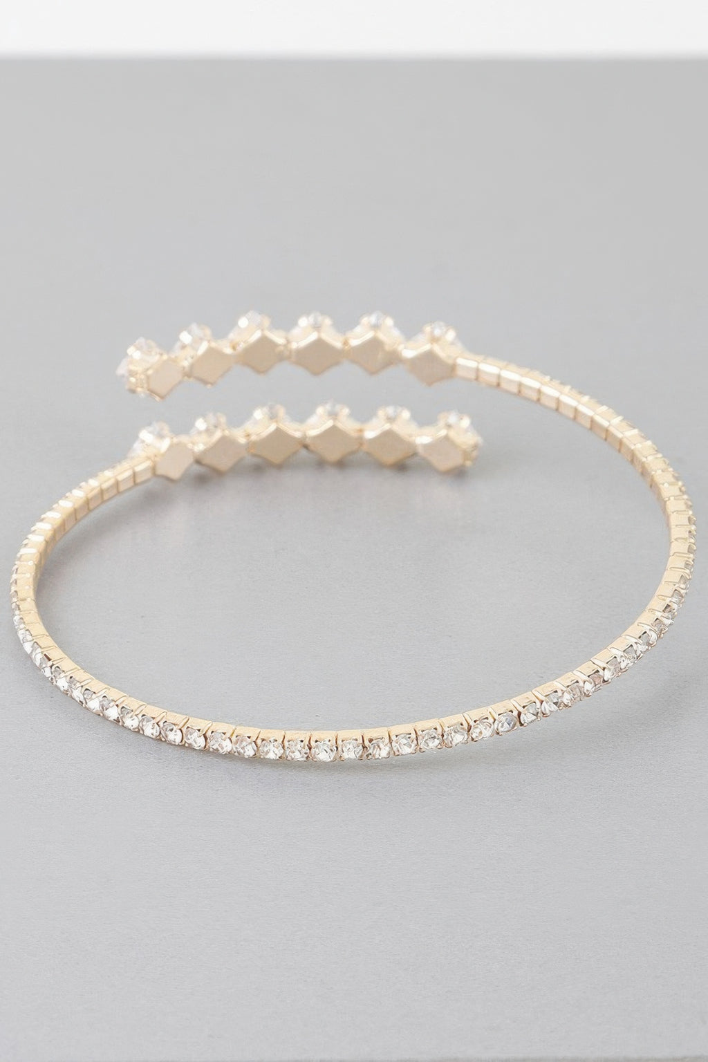 Crisscross rhinestone wrap bracelet with star setting and clear square stones