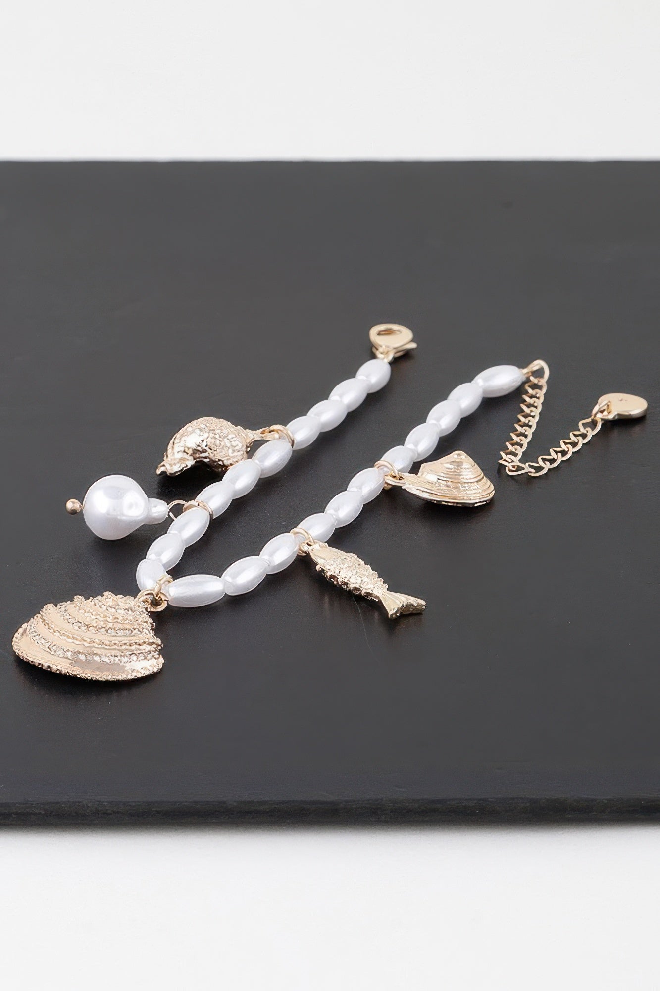 Jeweled Under The Sea bead bracelet with white links and gold fish + shell charms