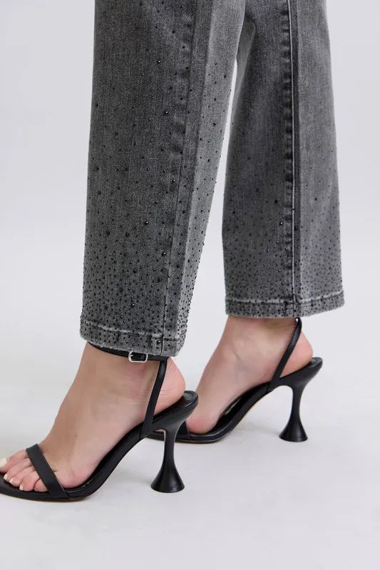 Gray straight jeans with rhinestone speckle along the hem and ankle
