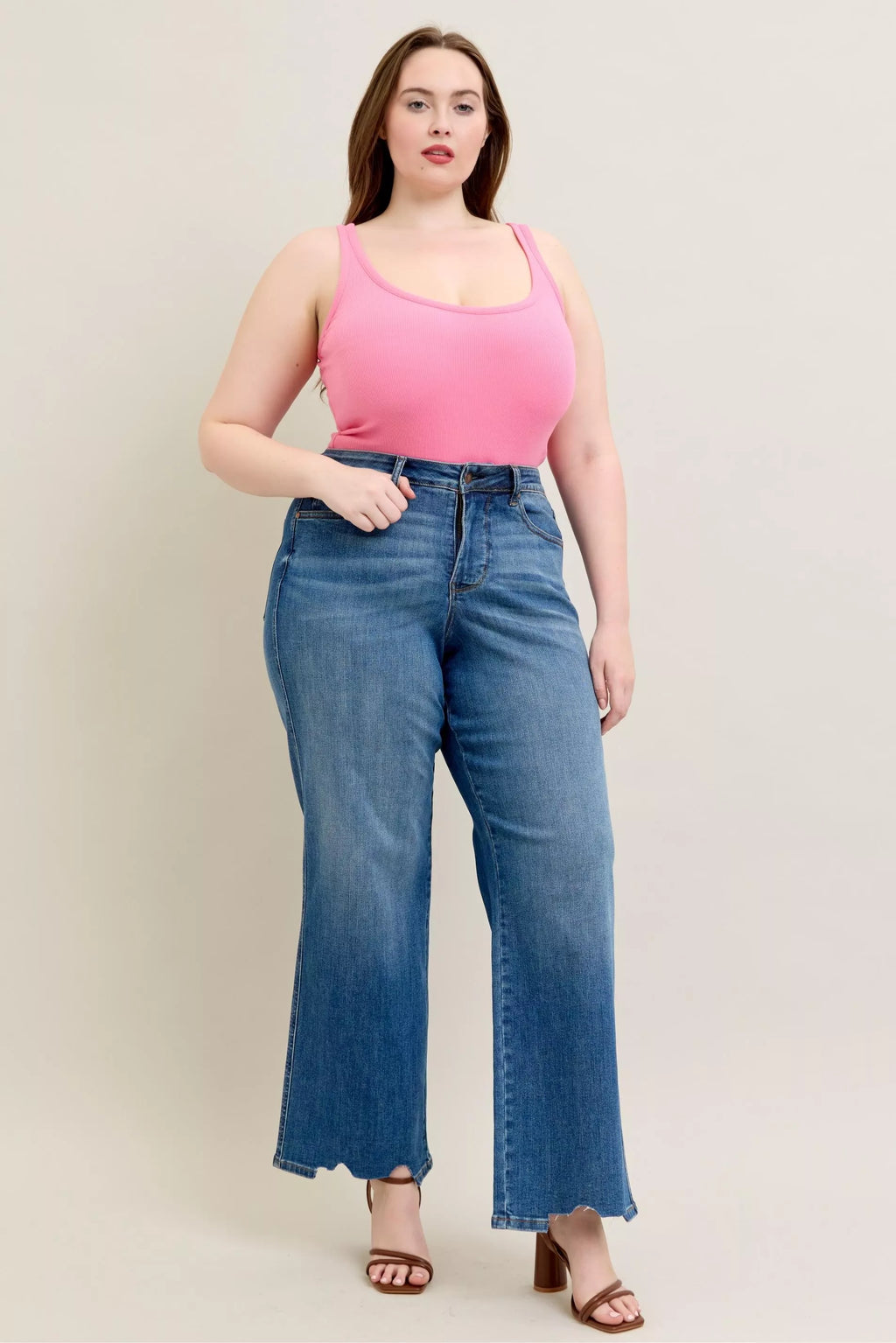 Mid-wash high-waist wide-leg jeans with destroyed hem and tummy-control fit