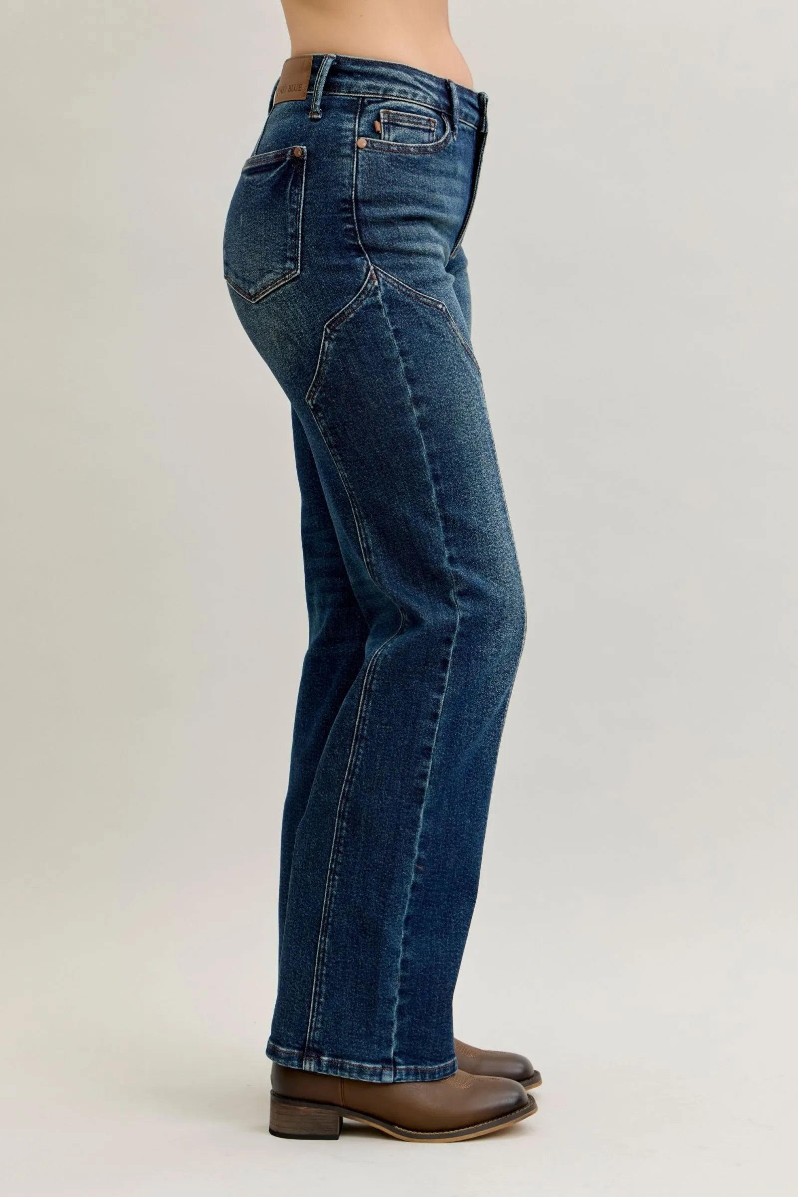 Dark denim straight-leg jeans, seam detailing and back patch pockets
