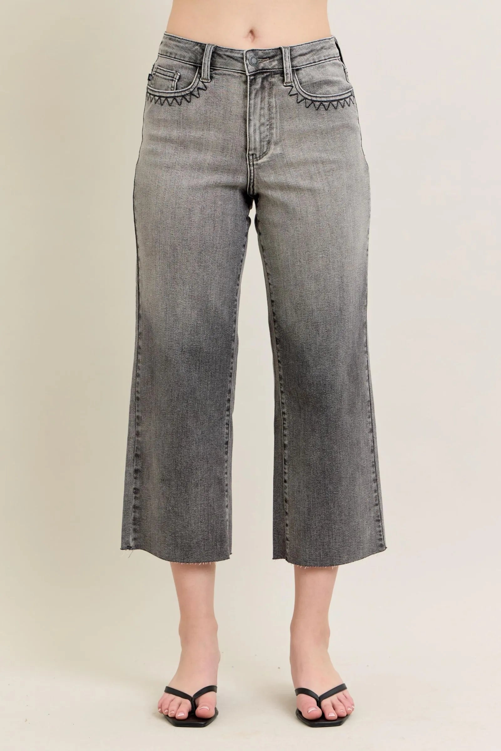 Gray wide-leg capri jeans with embroidered back pockets, plus size fit