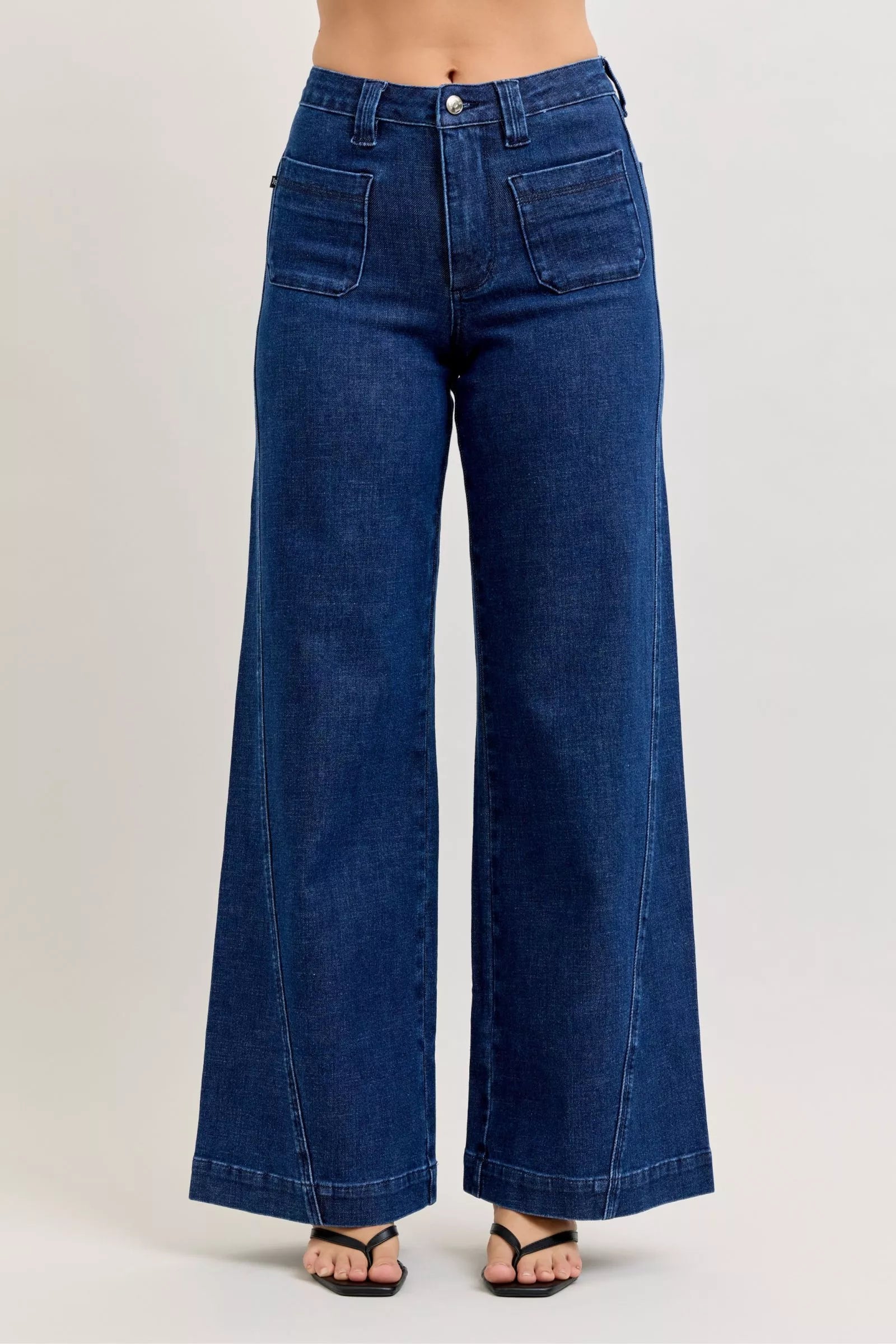 High-waisted wide-leg jeans, dark wash, button fly, front patch pockets