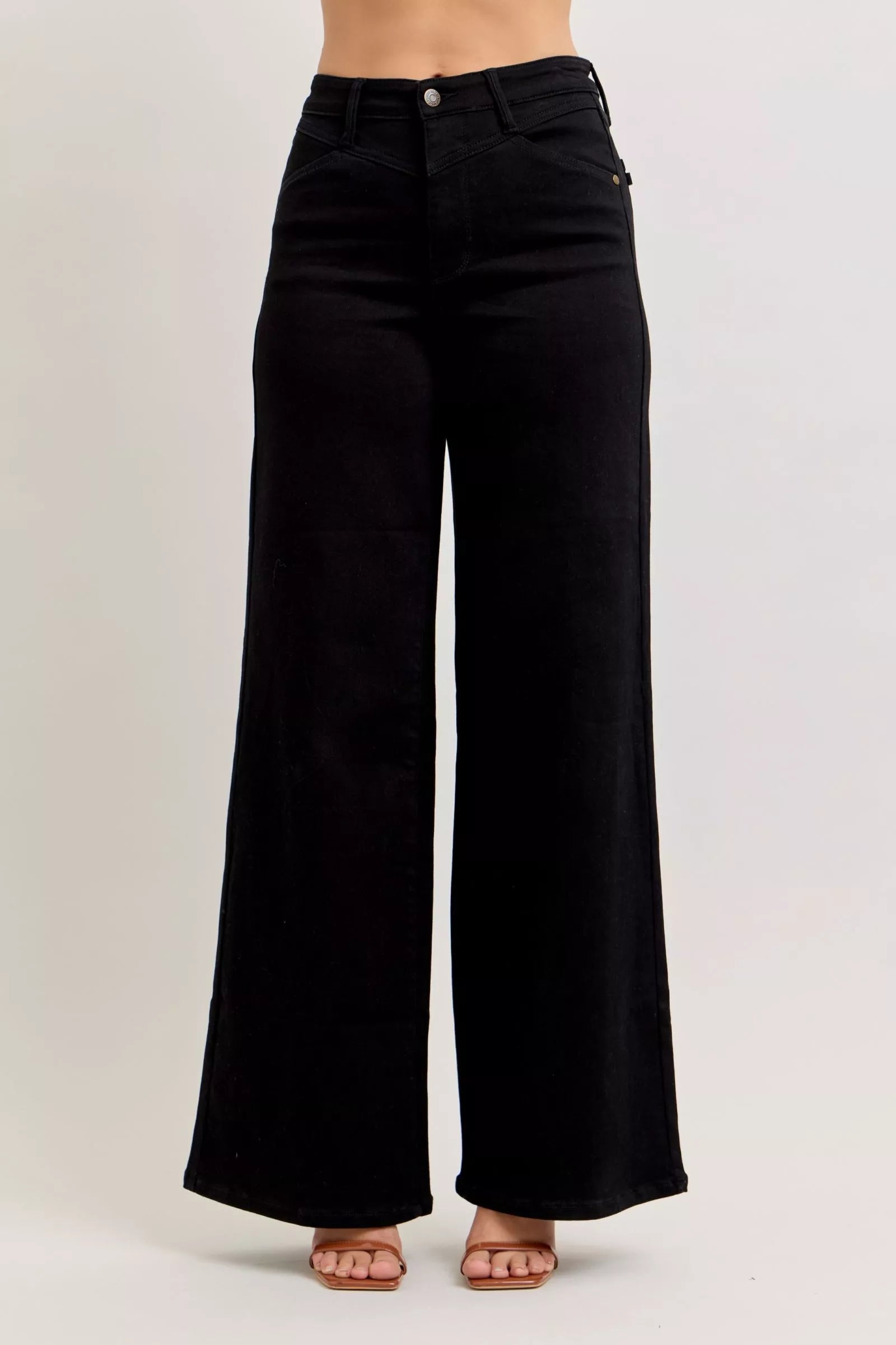 High-waisted wide-leg jeans, black wash, button and zipper front closure