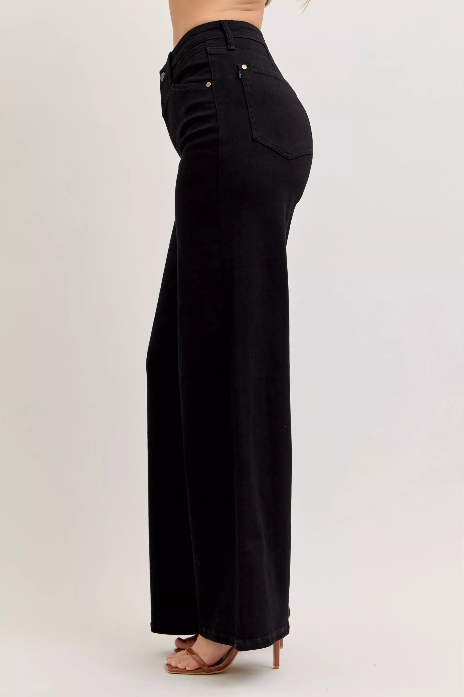 Black high-waisted wide-leg jeans, back view with pocket and yoke detail
