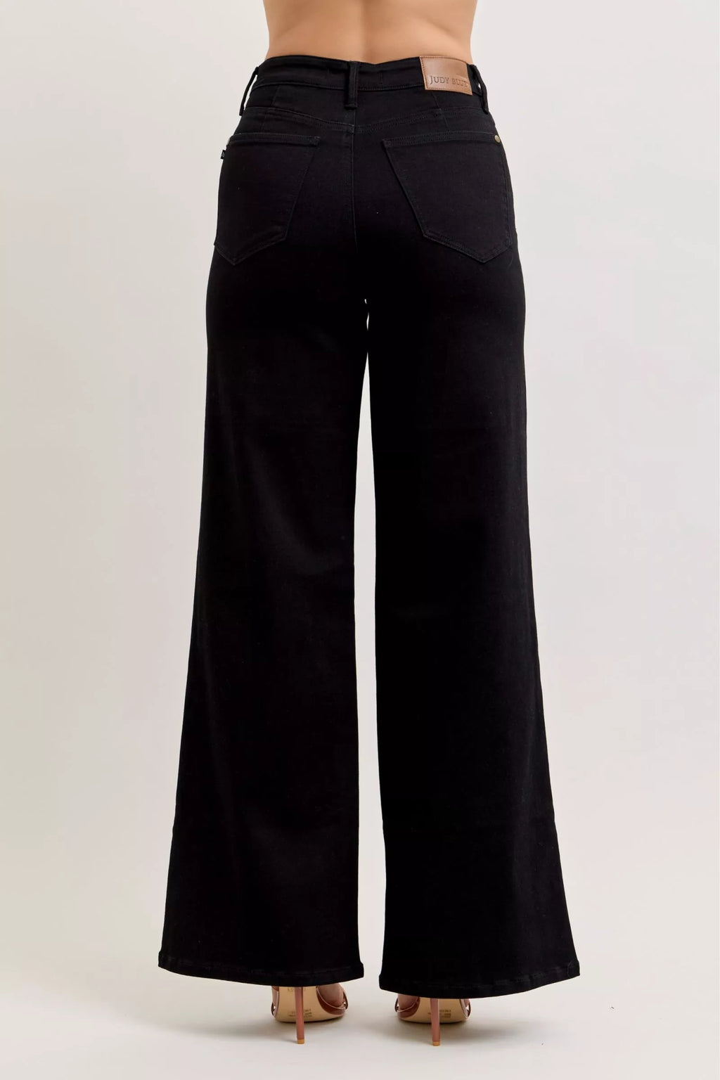 Trendsi black high-waisted wide-leg jeans, back view with two pockets