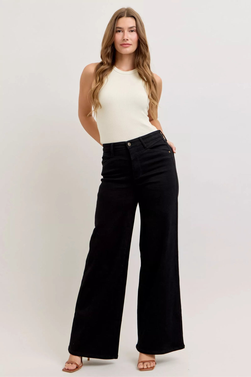 Black high-waisted wide-leg jeans with button fly and wide straight legs