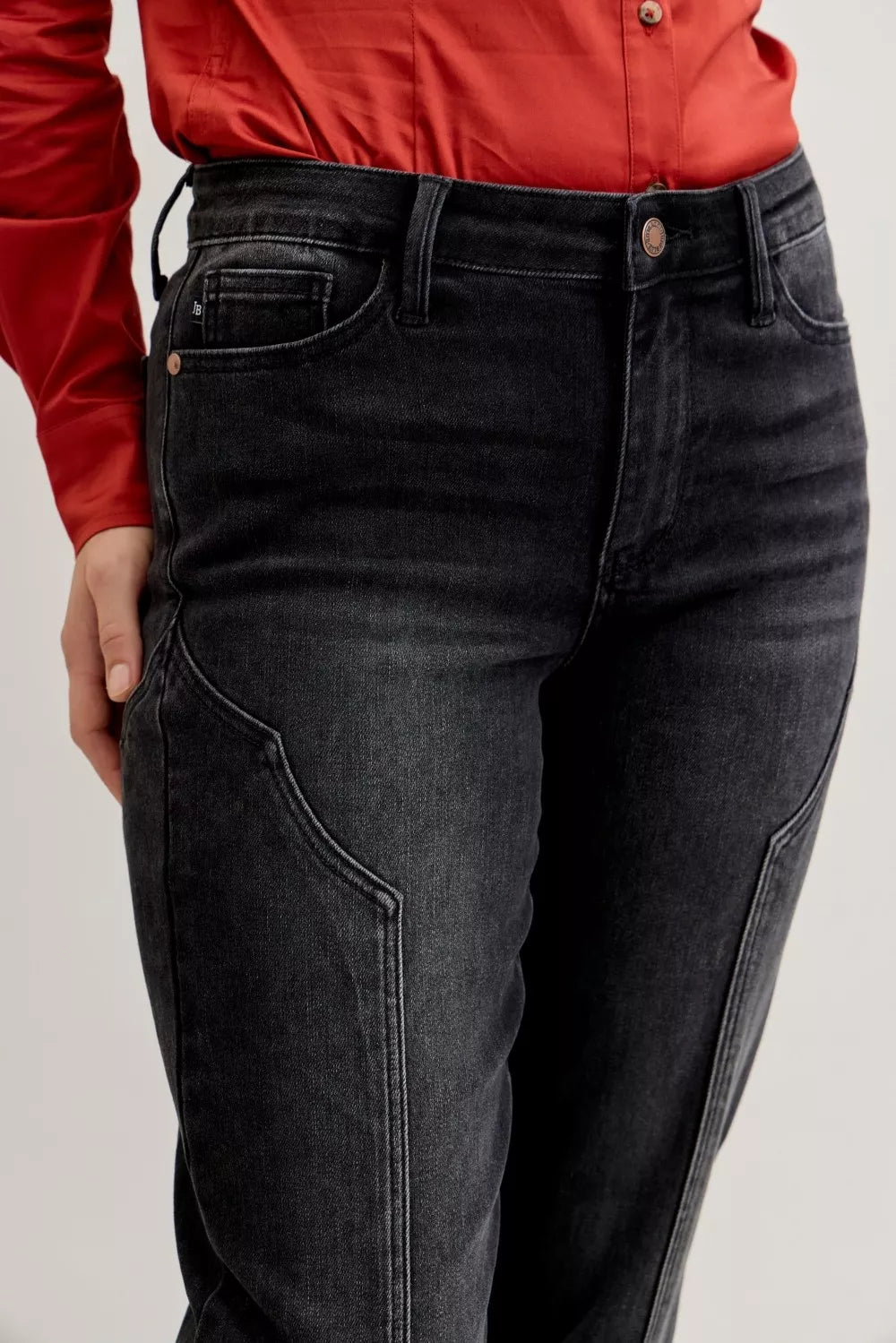 Black western seam jeans, mid-rise, close-up of front pockets and belt loop