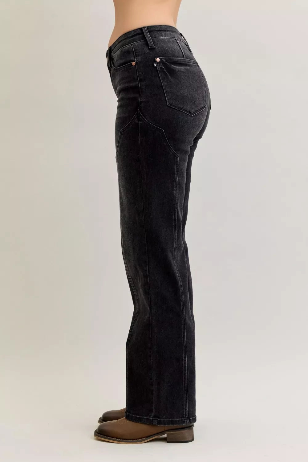 Black jeans side profile with western seam detail on the leg