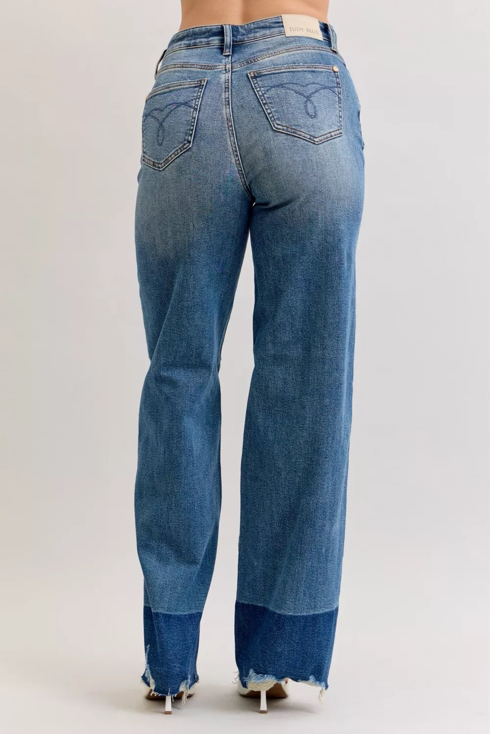 Dark wash (DK) straight jeans, back view with belt loops and pocket stitching