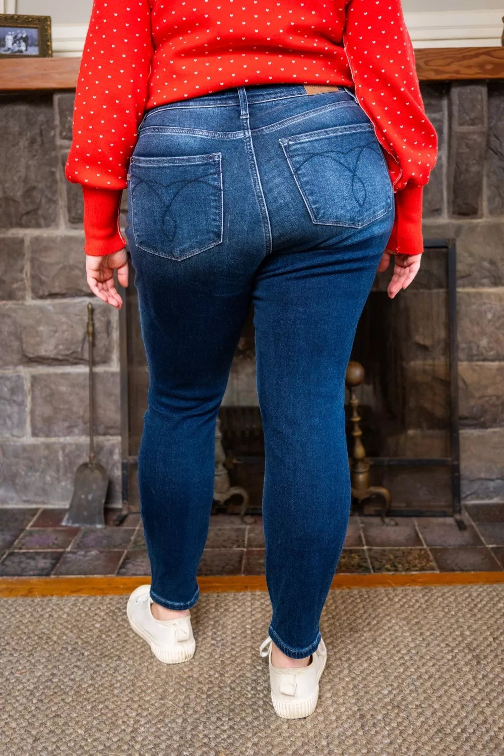 Dark blue washed thermal skinny jeans front view, zip fly and angled front pockets