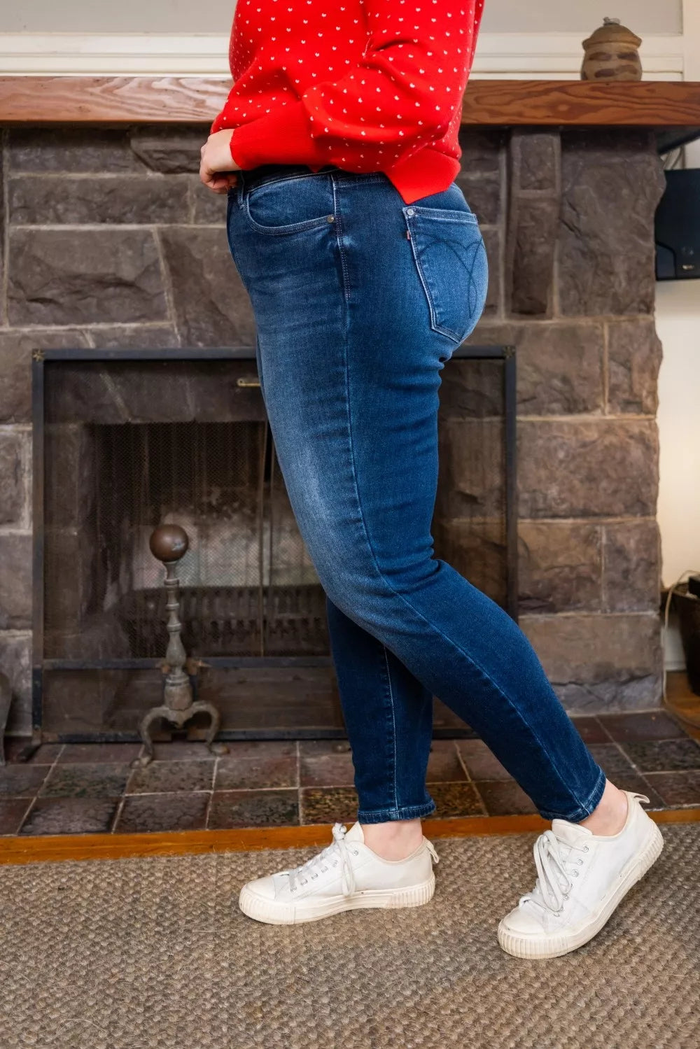 Dark blue washed thermal skinny jeans back view, curved yoke and back pocket detail