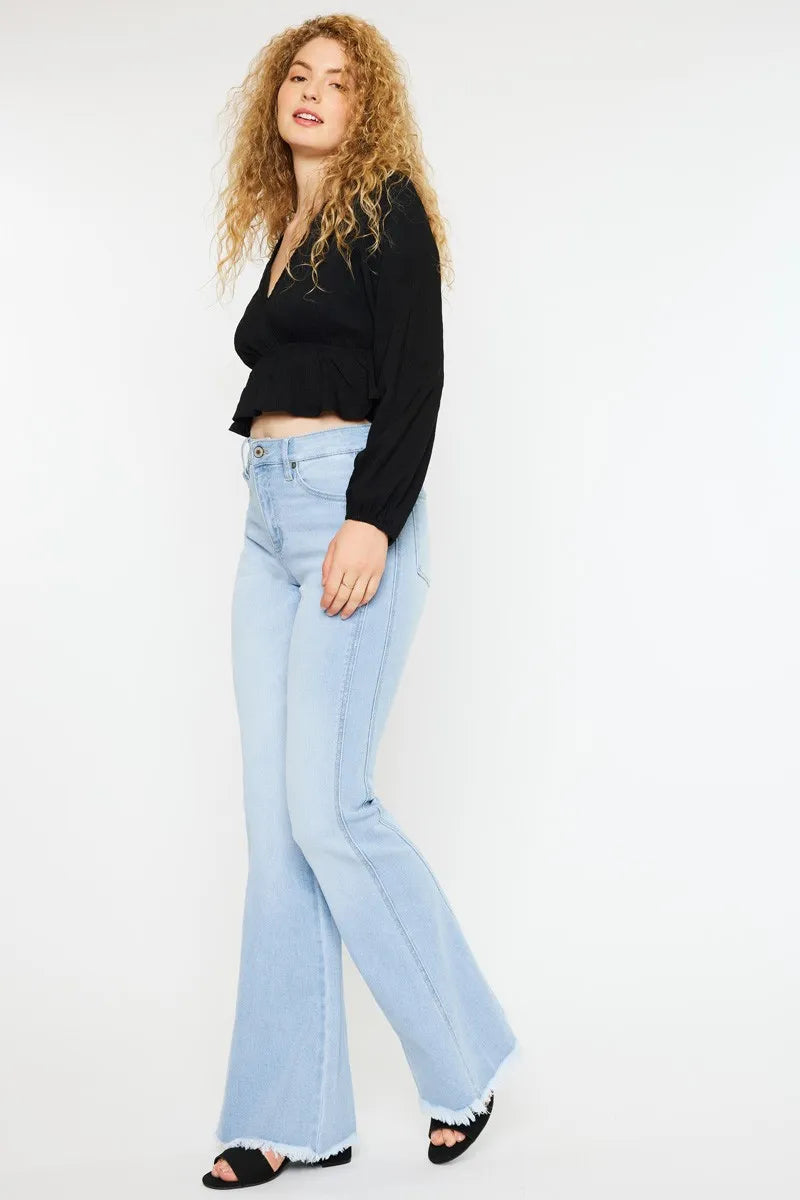 Light wash high-rise flare jeans with stitched seams and frayed ankle hem
