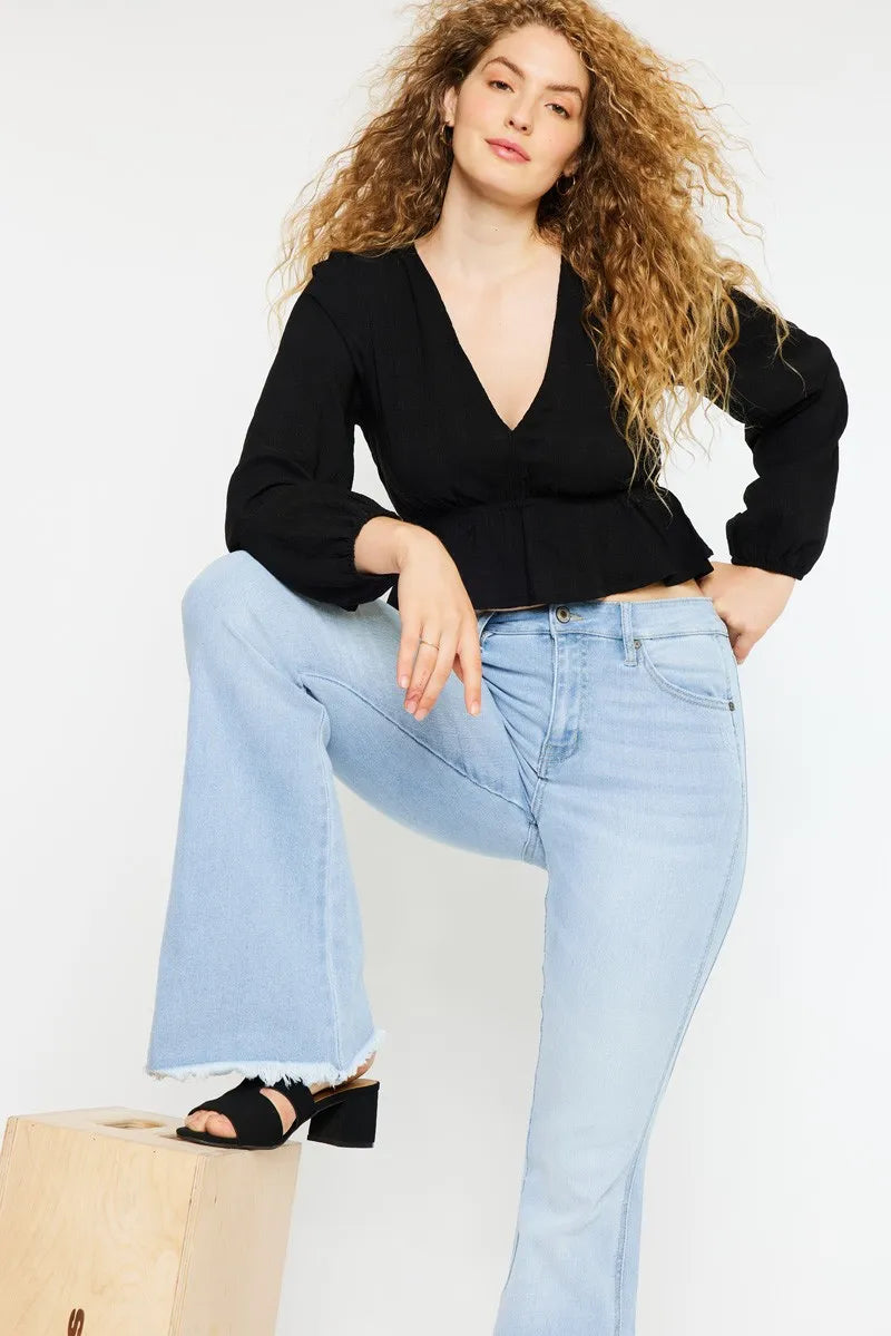 Light wash flare jeans with high-rise waist and five-pocket styling