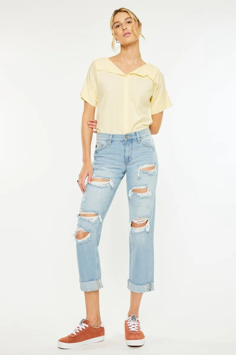 Light wash distressed mid-rise boyfriend jeans, cropped ankle with frayed rips