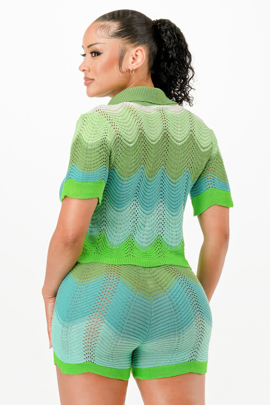 Back view of green-blue knit cardigan and matching drawstring shorts