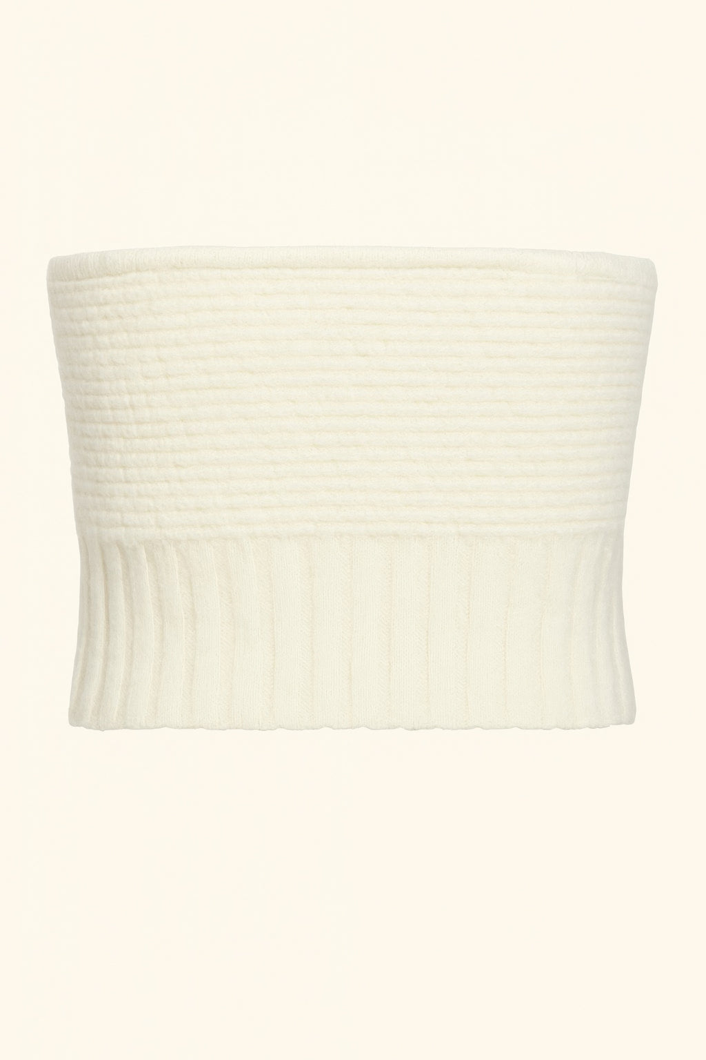 Cream knit tube top flat view of ribbed bodice and wide fitted band hem