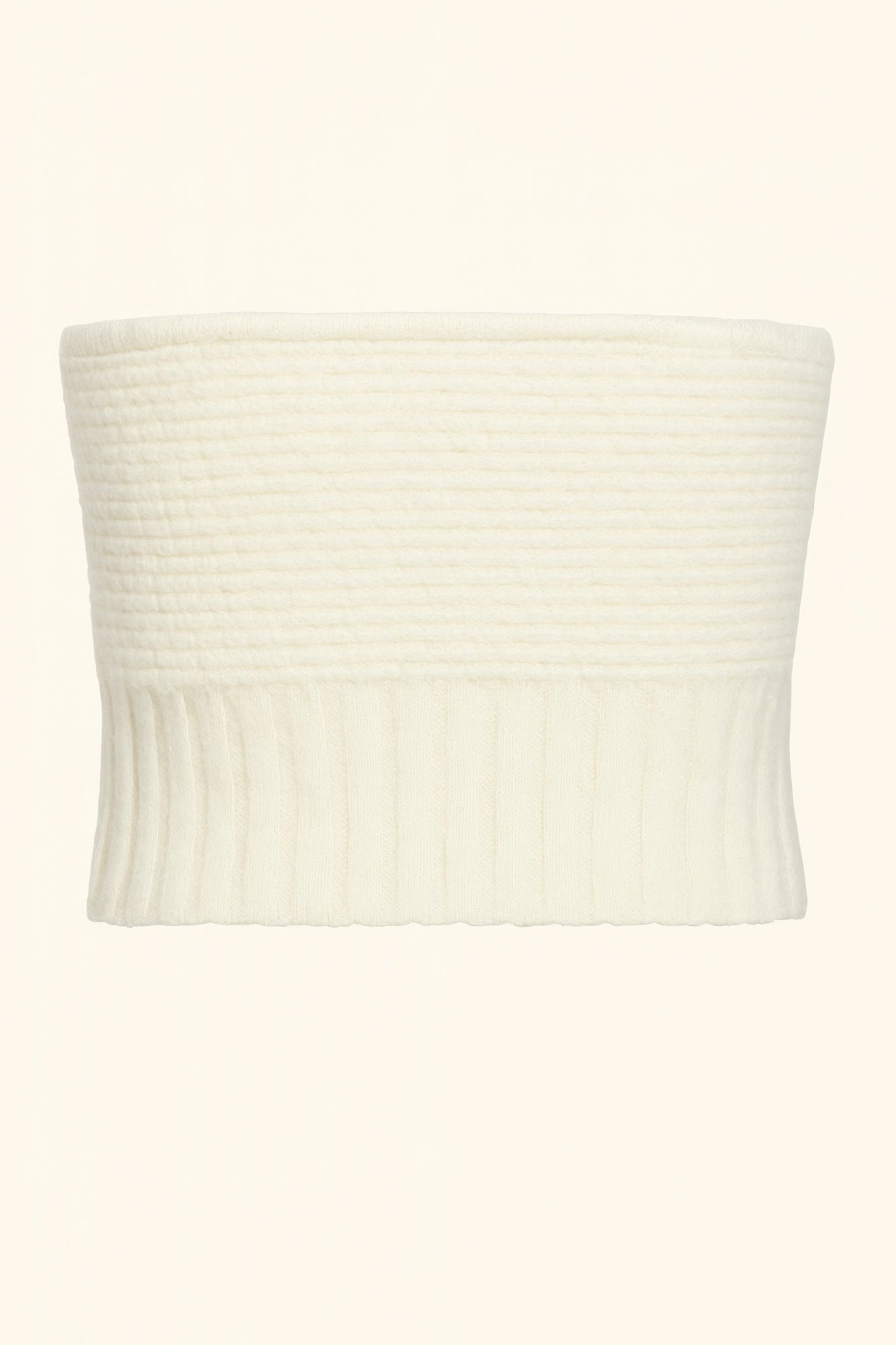 Cream knit tube top flat view of ribbed bodice and wide fitted band hem