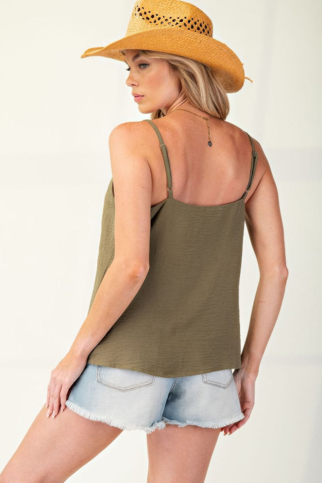Back view: olive camisole with thin adjustable straps and textured poly weave