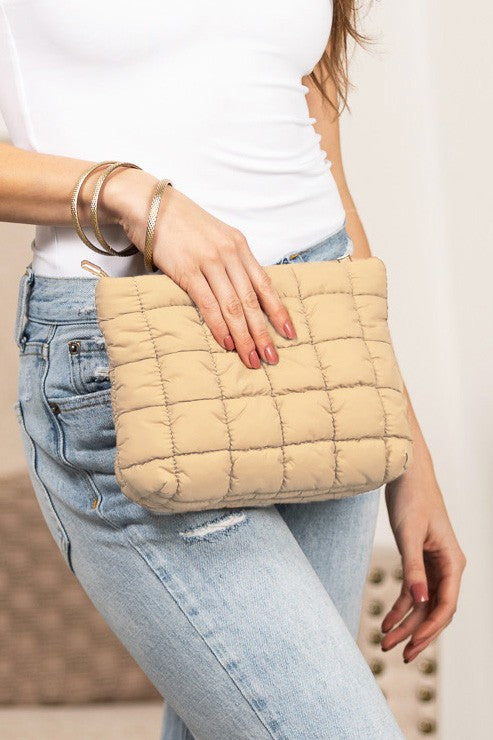 Lainey Quilted Puffer Clutch in buff, quilted panels and wrist strap