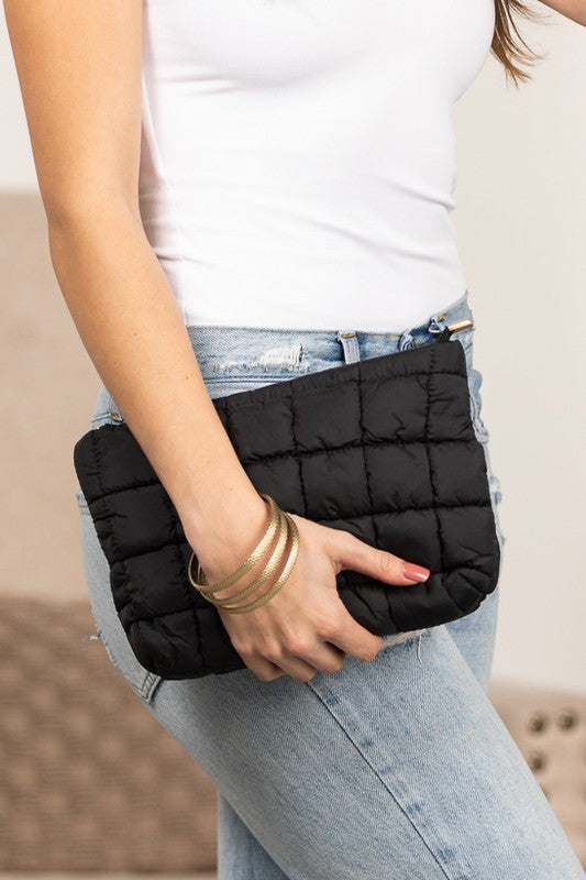 Lainey Quilted Puffer Clutch in black, quilted puffer style with wrist strap