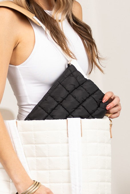 Lainey Quilted Puffer Clutch in black, front quilt squares and top zipper
