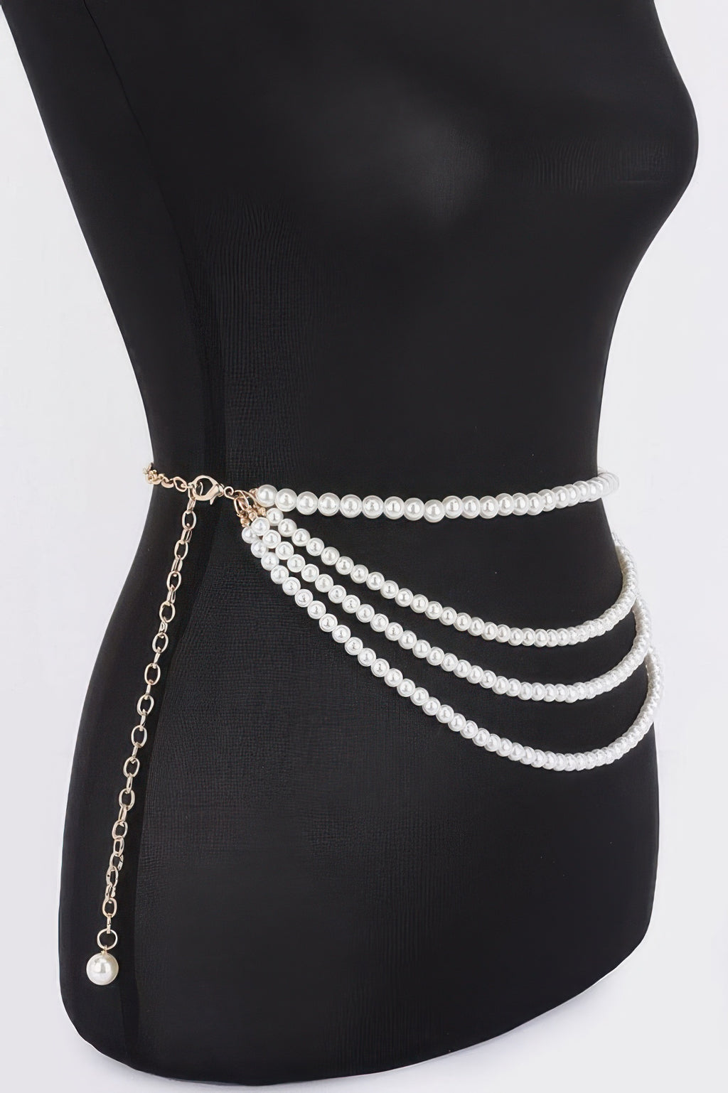 Black belt with faux pearl rows and dangling gold chain with pearl drop