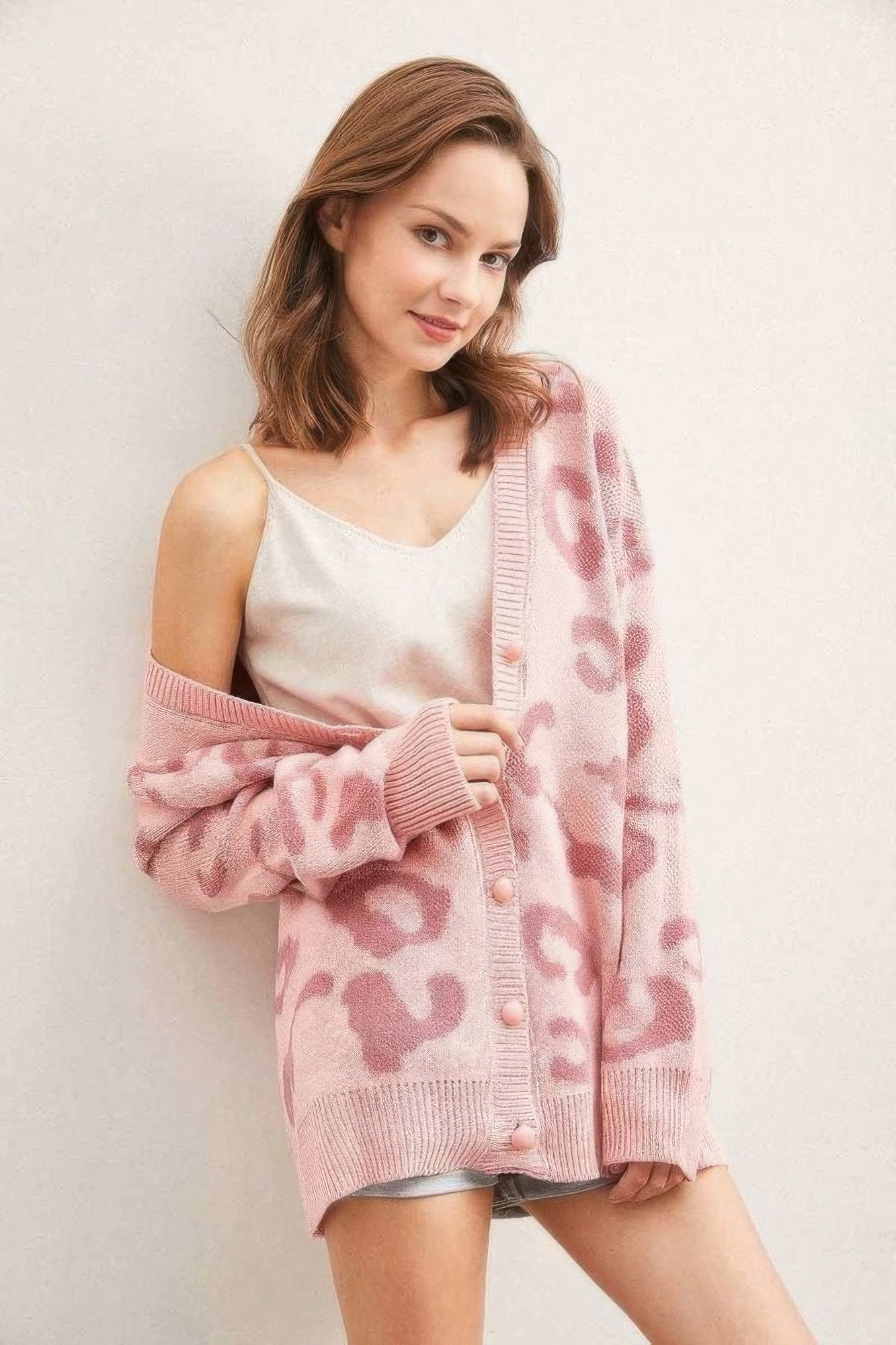 Leopard button-down cardigan in pink with button front and long sleeves