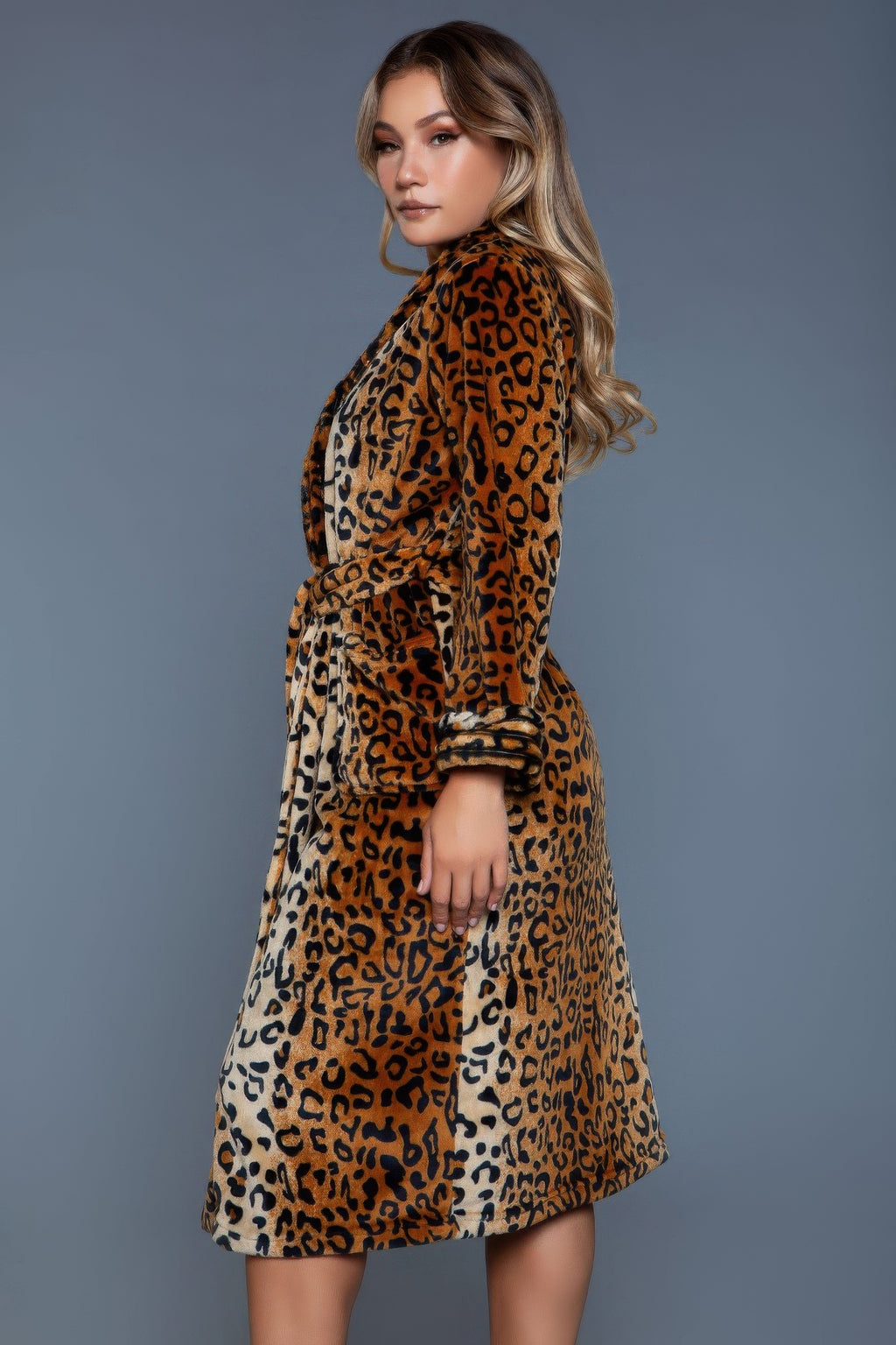 Leopard robe side view, button-front with tied belt and knee-length skirt