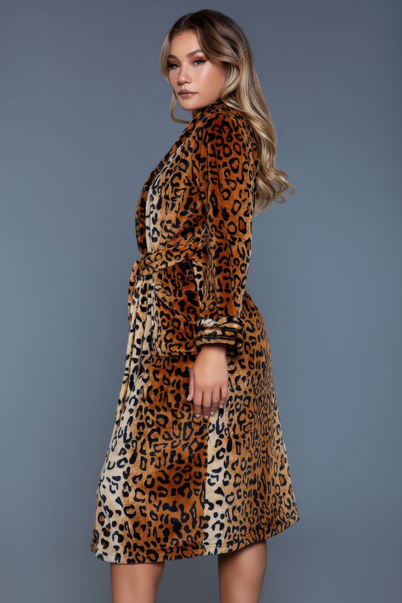 Leopard robe side view, button-front with tied belt and knee-length skirt