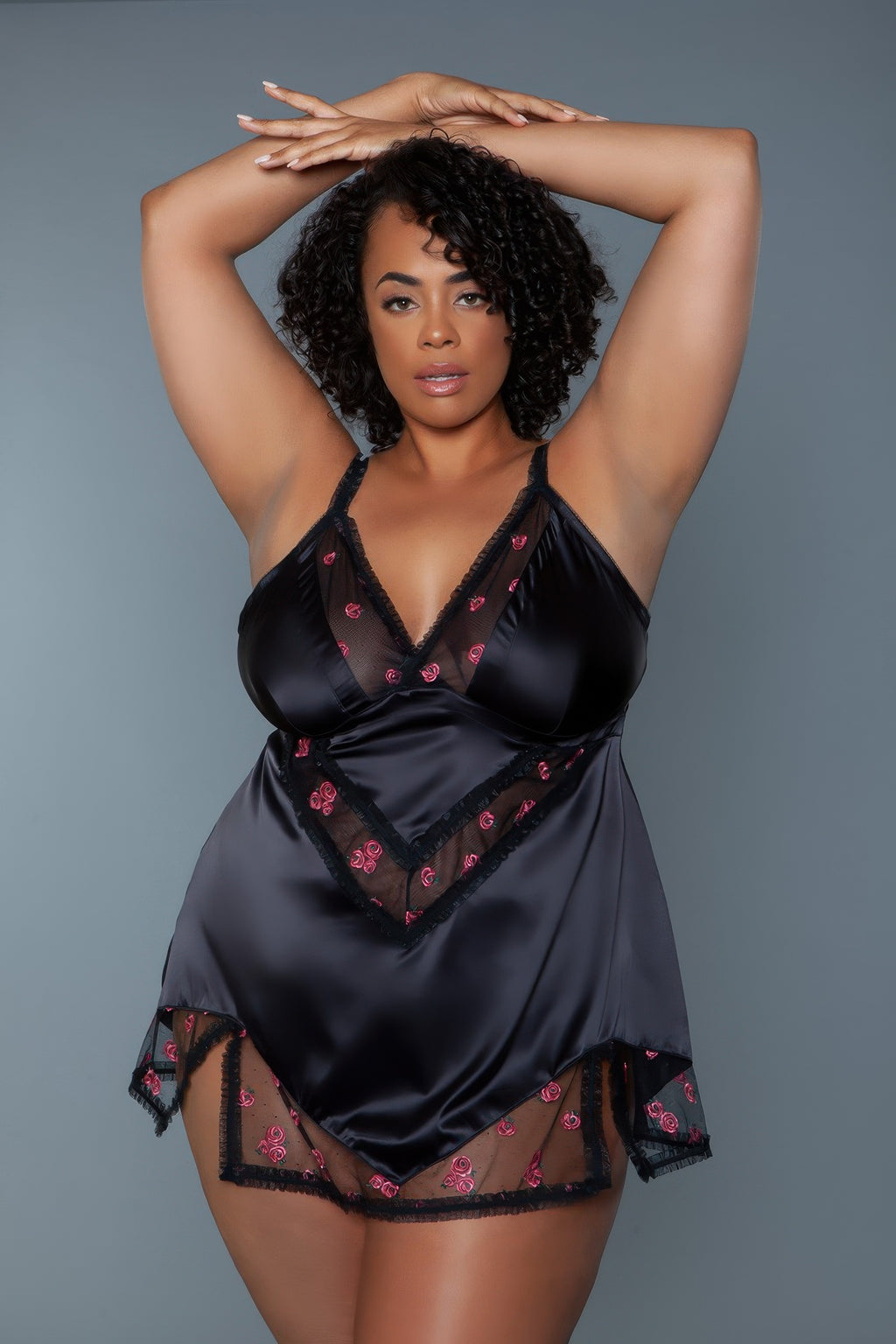 Black babydoll lingerie with pink rose embroidery, deep V neckline and mesh lace accents